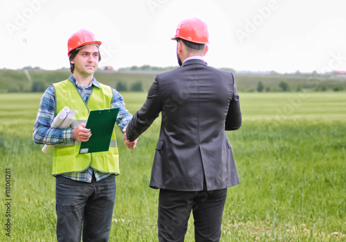 man with cottage plan construction