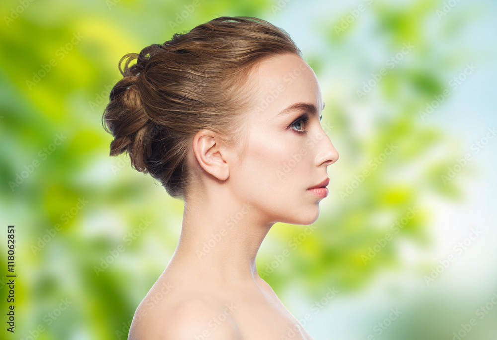 beautiful young woman face over white background beautiful young woman face over white background