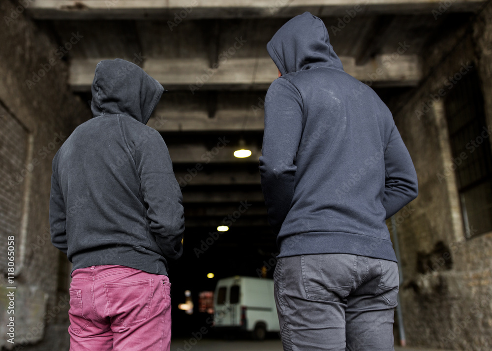 addict men or criminals in hoodies on street addict men or criminals in hoodies on street