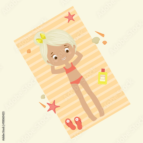Little girl on a beach towe