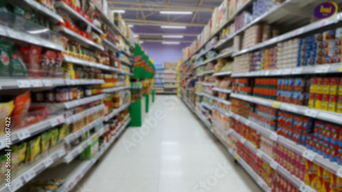 Obraz na płótnie shelf supermarket in blurry for background w salonie