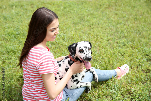 Owner with her dalmatian do...