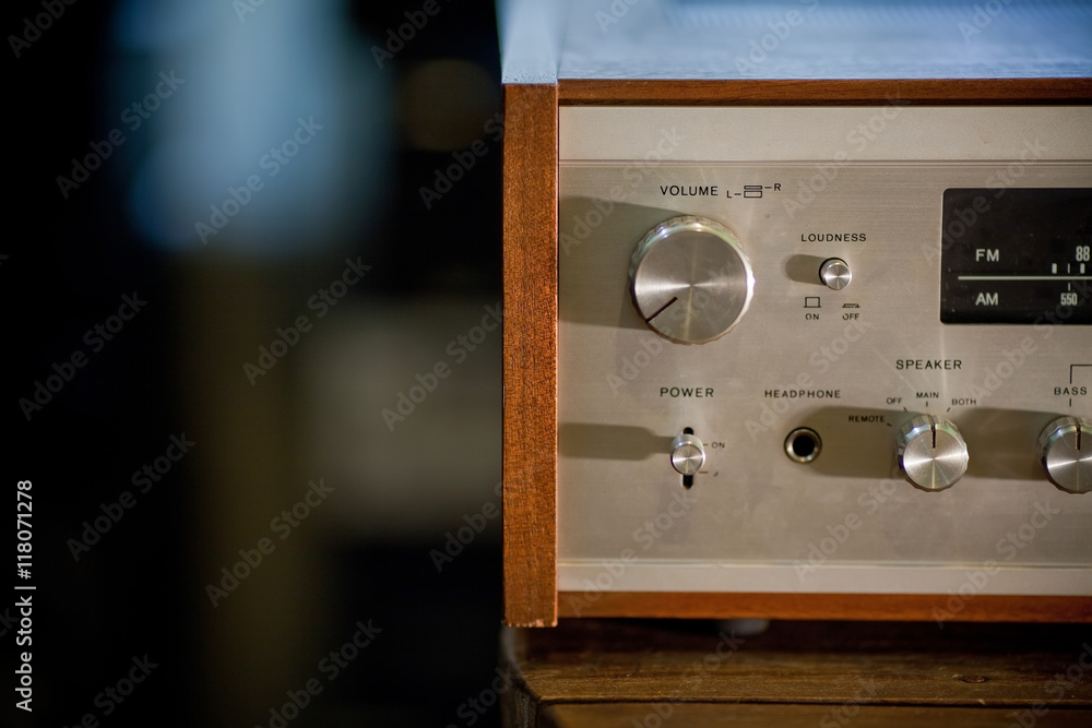Vintage stereo receiver in wooden cabinet - obrazy, fototapety, plakaty 