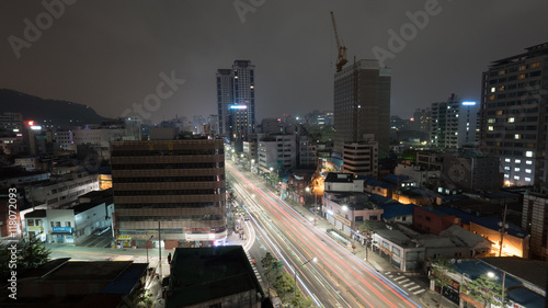 Metropolis at night. Cityscape with cars driving on highway. Seoul, Republic of Korea