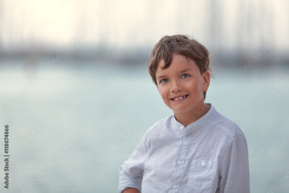 Portrait of happy boy on background of sea, Portrait of happy boy on background of sea,