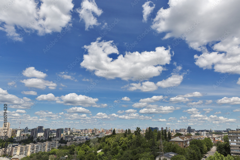 Kiev aerial cityscape with white clouds and blue sky, Ukraine