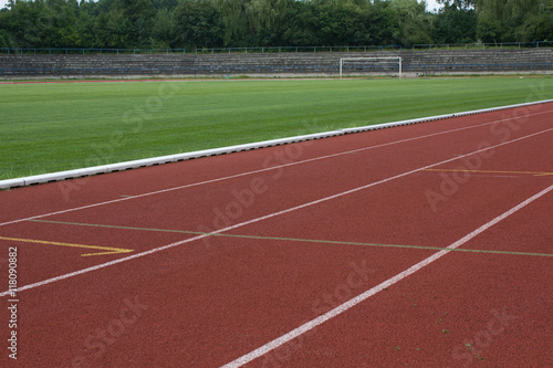 Running track and football pitch on a old athletic stadium © encierro