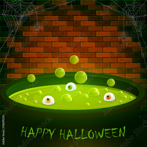 Brick wall with spiders and Halloween cauldron with eyes