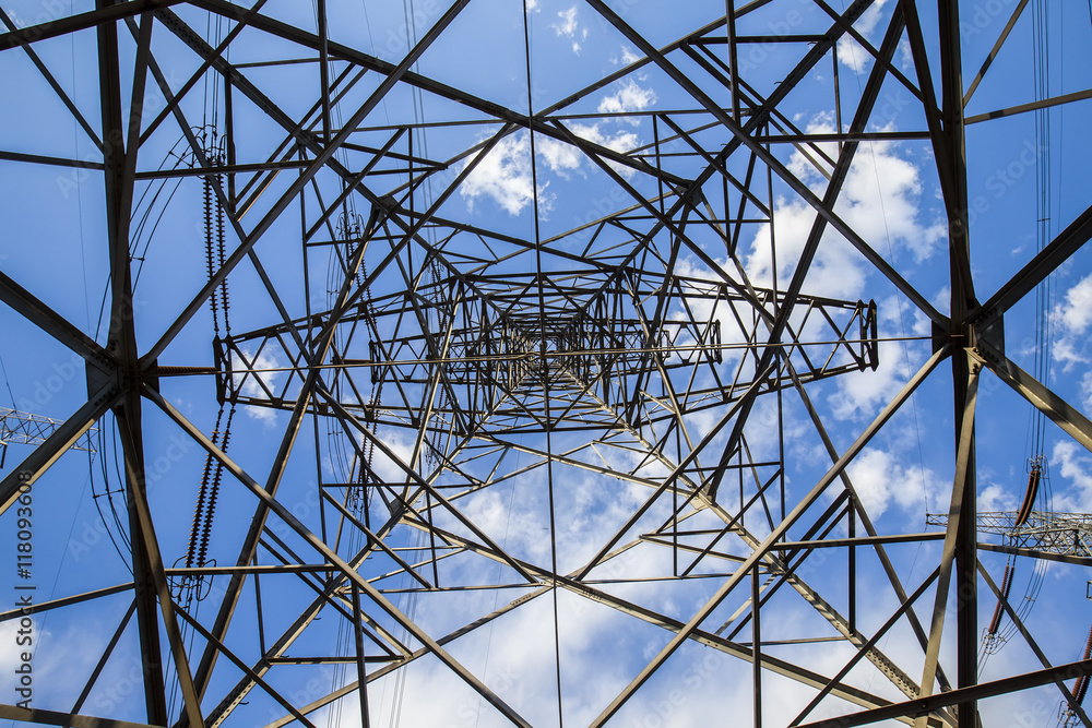 Pylon under the blue sky white clouds