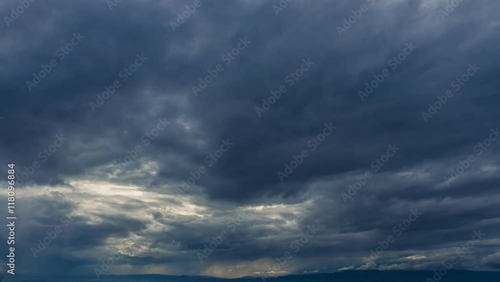colorful dramatic sky with cloud and rain at sunset colorful dramatic sky with cloud and rain at sunset