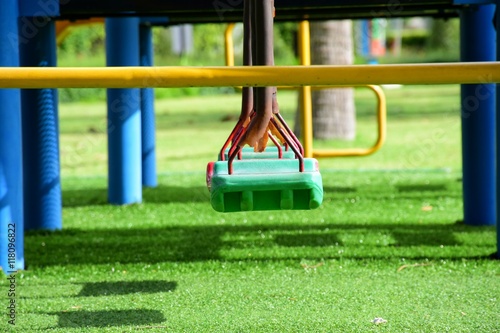 Swing kids in playground