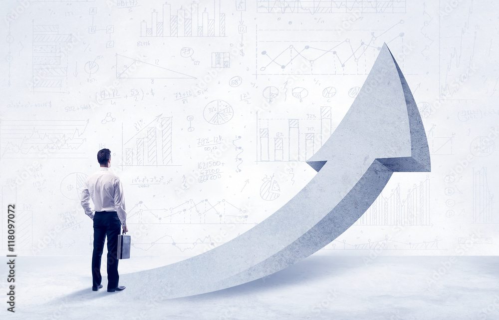 Obraz premium Financial businessman with arrow concept