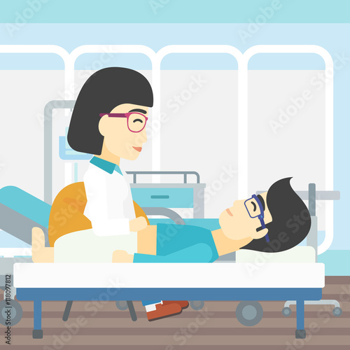 Doctor touching abdomen of male patient.