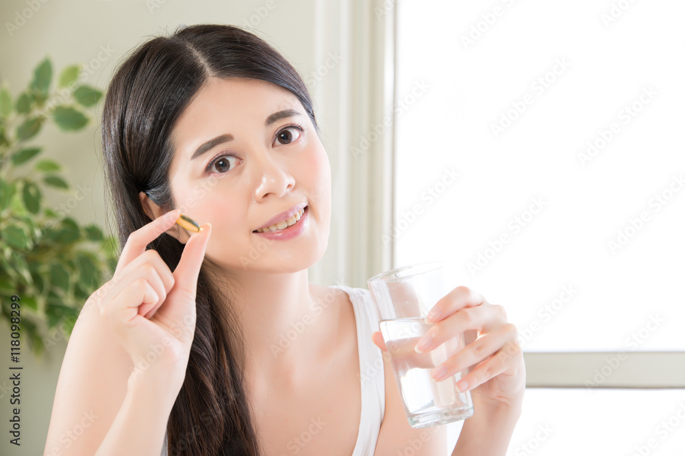 beautiful asian women healthy diet eating vitamin pill beautiful asian women healthy diet eating vitamin pill