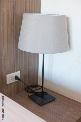 reading lamp on bedside table