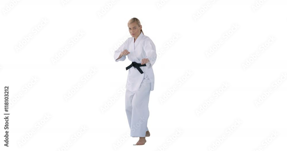 Woman doing judo against white background Woman doing judo against white background