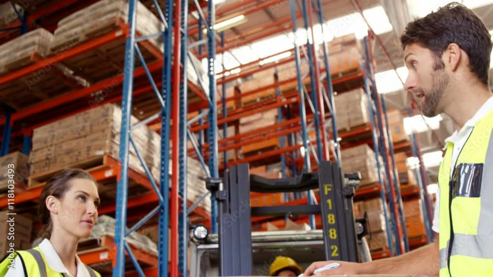 Warehouse workers working together Warehouse workers working together