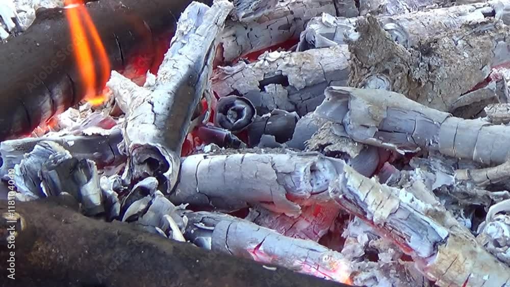 Hot fireplace full of wood and fire. Burning fire and bright coals. Hot fireplace full of wood and fire. Burning fire and bright coals.