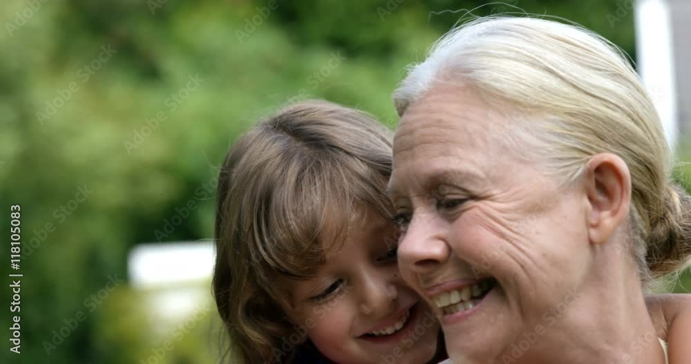 Grandmother and child in the garden Grandmother and child in the garden