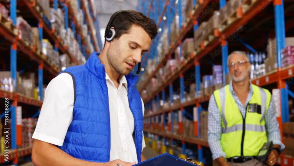 Warehouse workers working together Warehouse workers working together