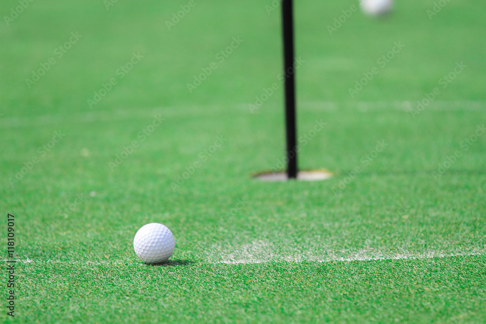 Golf ball on the green Golf ball on the green