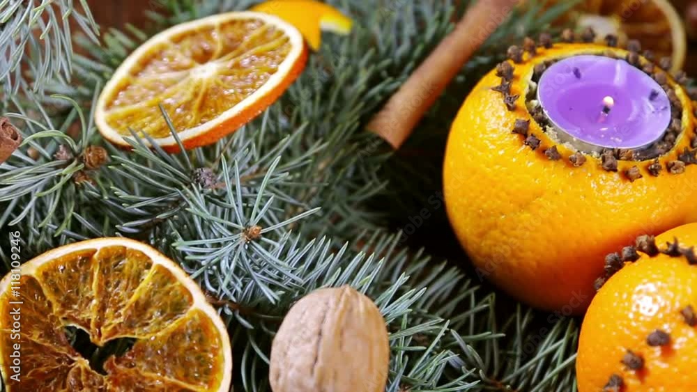 dried orange slices and oranges with cloves. Christmas decorations. dolly shot dried orange slices and oranges with cloves. Christmas decorations. dolly shot