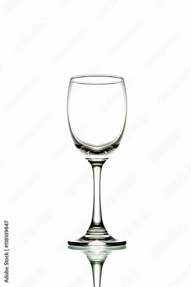 Glass with mirror reflection on white background