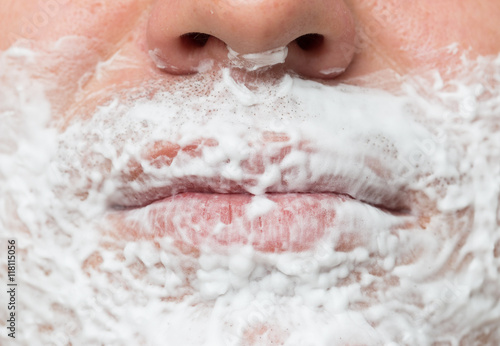 beard man shaving in the foam