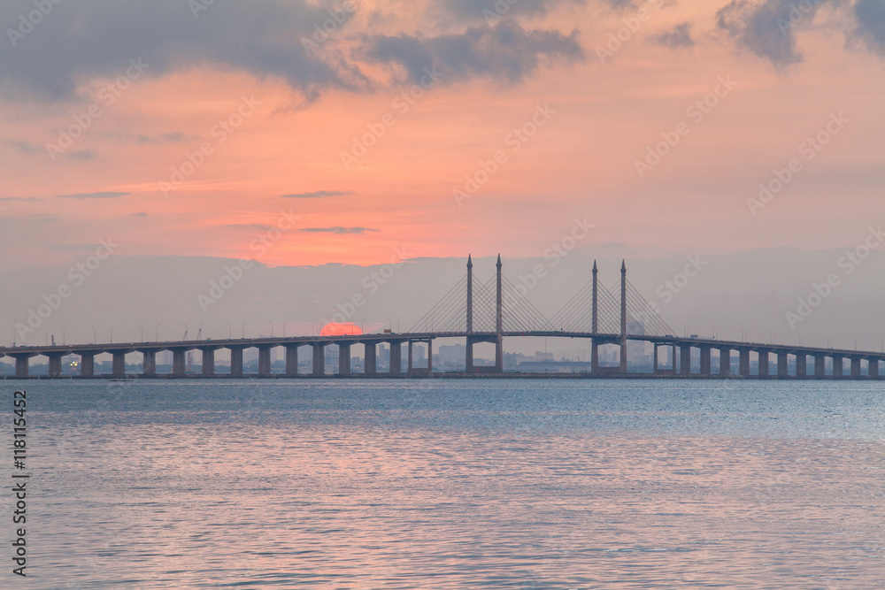 Sunrise by the shore with view of Penang Bridge