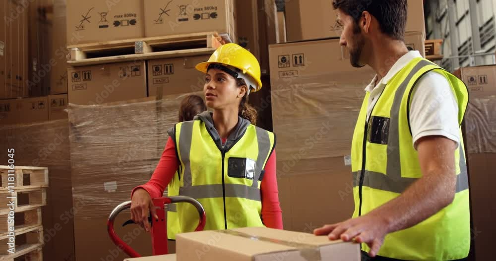 Warehouse workers working together Warehouse workers working together