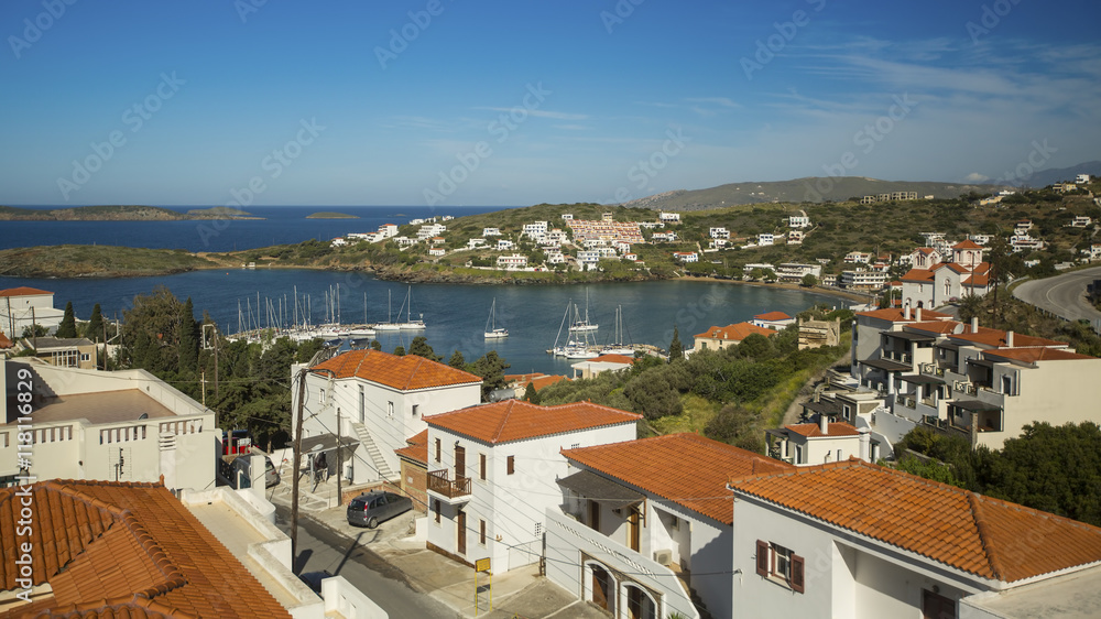 View of the Marina and a small town on the Andros island, Greece.