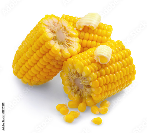 Corn combs isolated on a white background. Sweetcorn with butter closeup