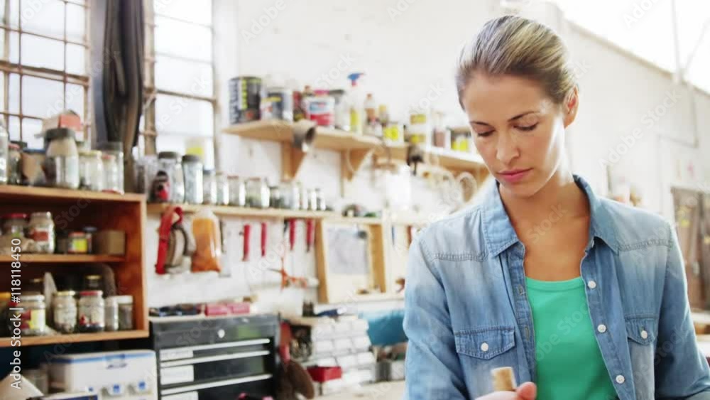 Portrait of attractive female carpenter working Portrait of attractive female carpenter working