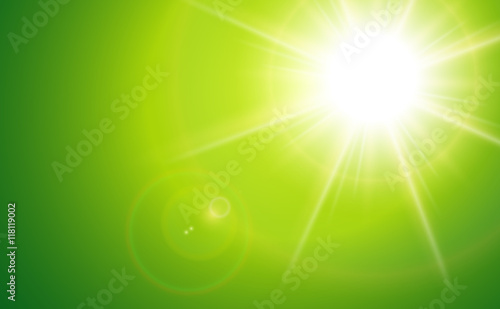 Sun with lens flare, green ...