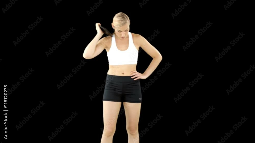 Athletic woman preparing to throw a discus Athletic woman preparing to throw a discus