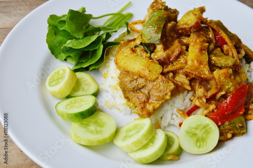 stir fried wild boar with red curry on rice