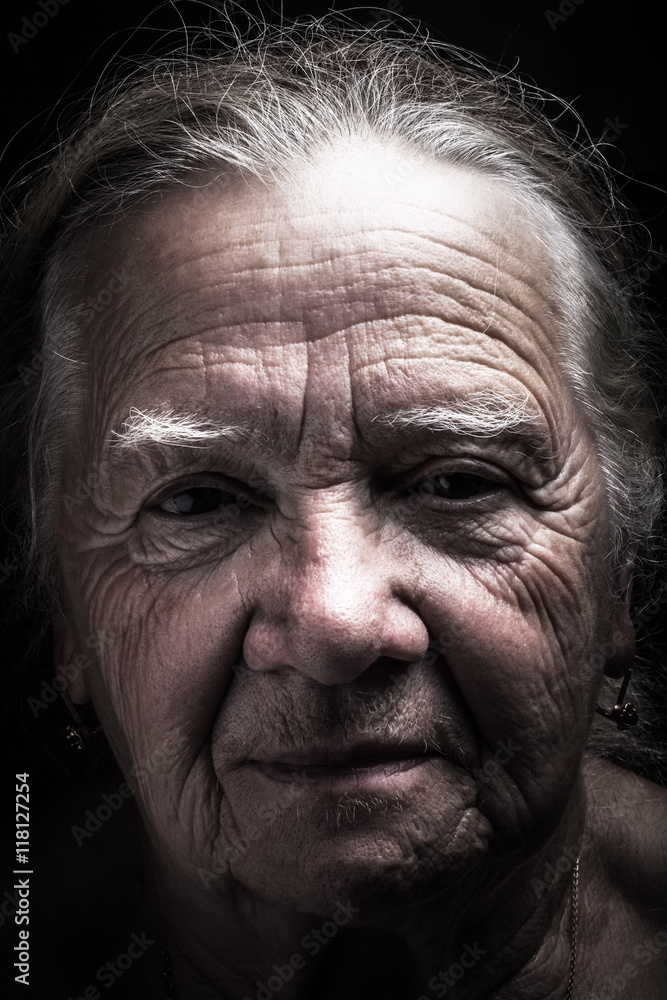 Portrait of elderly woman. Serious. Toned Portrait of elderly woman. Serious. Toned
