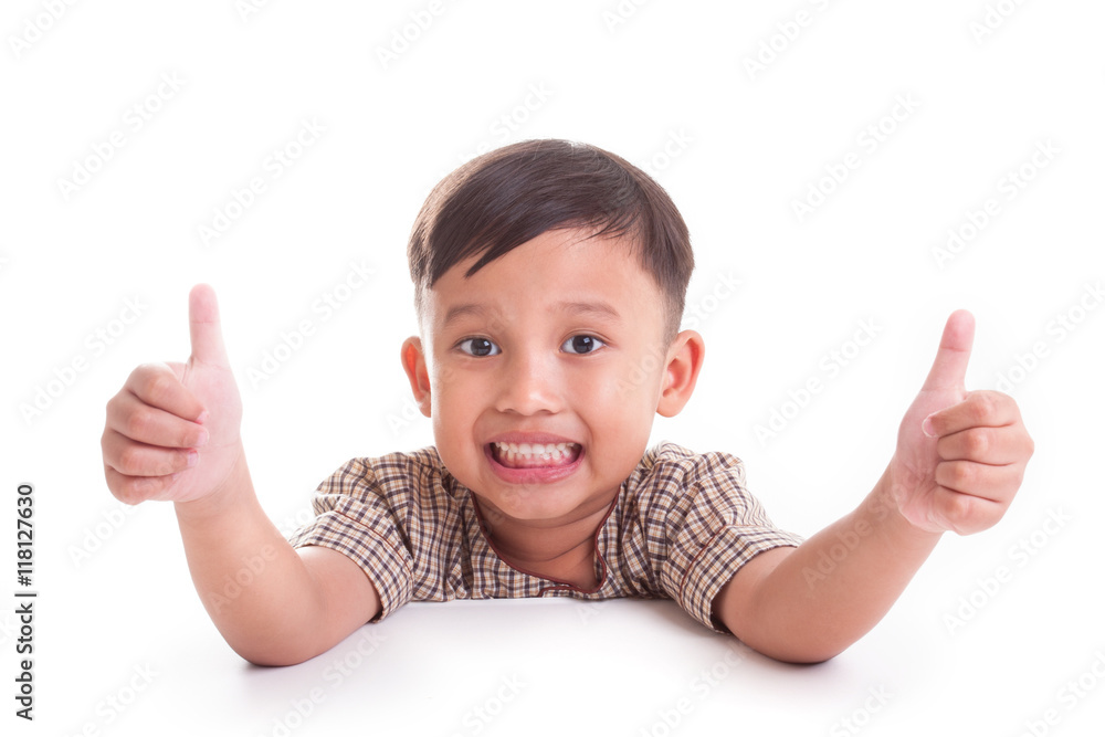 Portrait of happy boy showing thumbs up gesture, on white background Portrait of happy boy showing thumbs up gesture, on white background