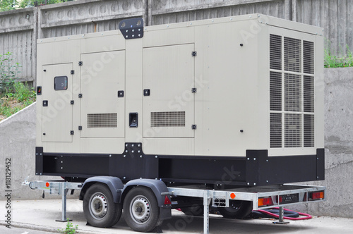 Commercial backup generator. A standby generator is a back-up electrical system that operates automatically. A standby power system may include a standby generator, batteries and other apparatus.