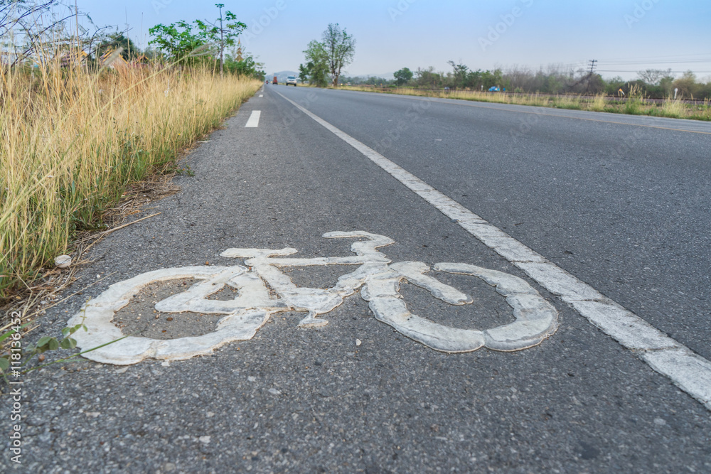 Obraz premium Bicycle symbol on city street