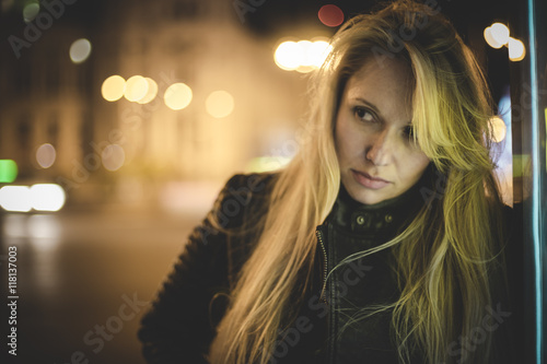 Madrid, sensual blond in the city at night, with neon lights and © Fernando Cortés
