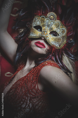 Blonde with gold mask on red cloth embroidered golden thread, my