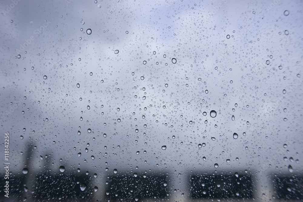 Obraz premium close up water drop of raining on a window,water drop texture background
