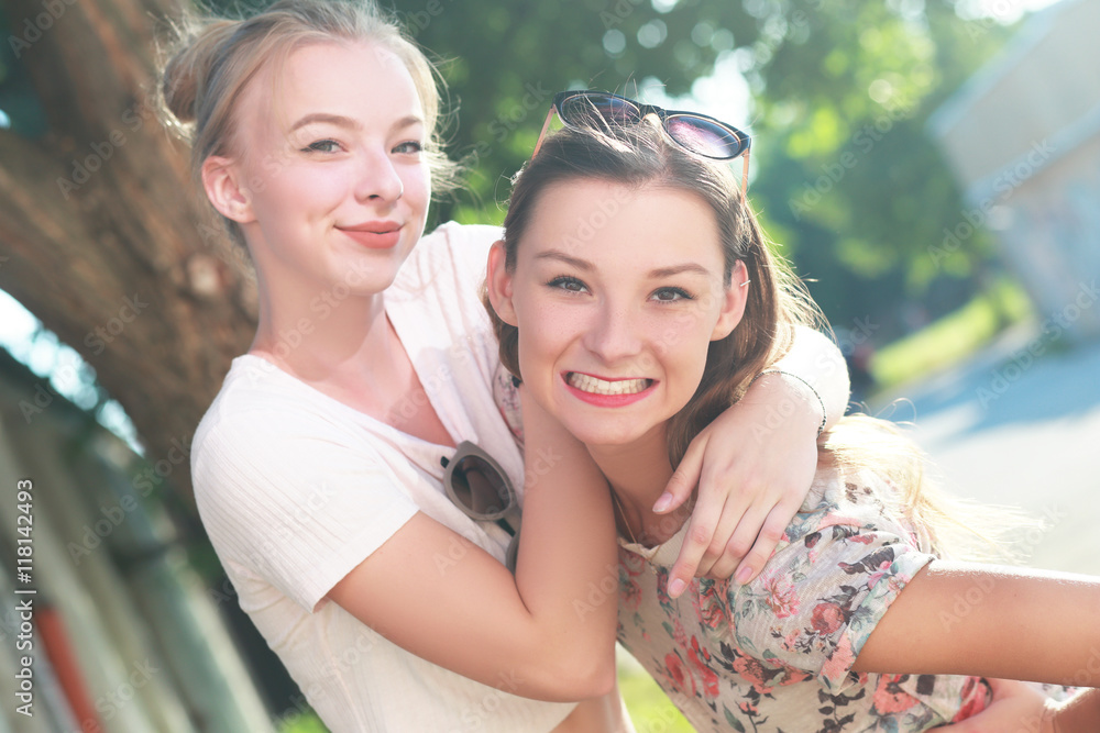 Two young girlfriends