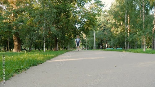 Wallpaper Mural The man likes to run in the park, for a healthy lifestyle Torontodigital.ca
