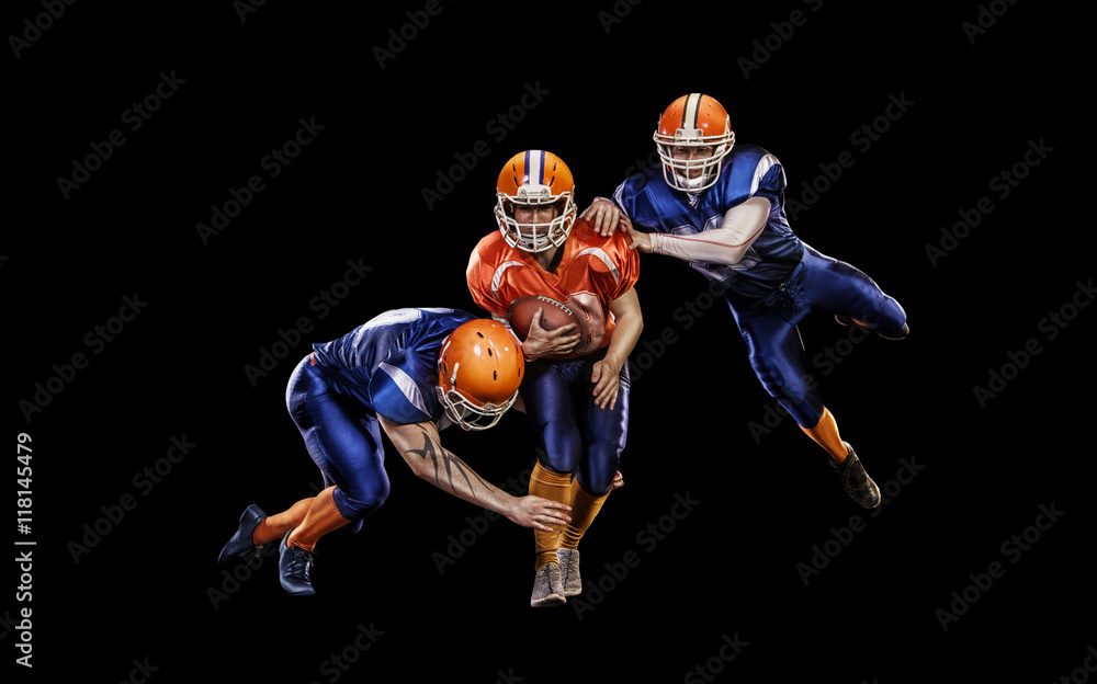 American football players in action on black background