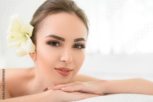 Carefree woman relaxing at beauty salon