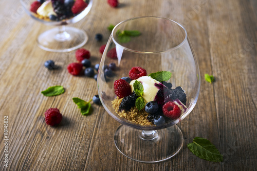 Deconstructed cheescake with mixed berries, selective focus