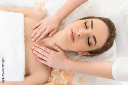 Young woman getting treatment at spa