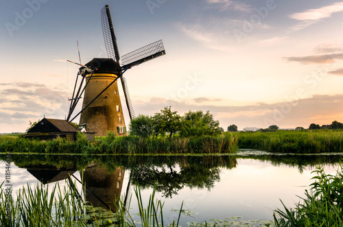 Beautfiful Traditional Windmill at Sunset and Reflection in Water